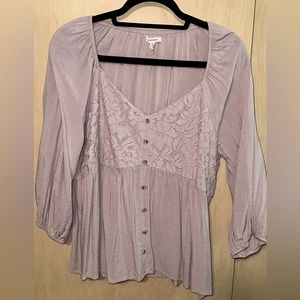 Woman’s size large lavender blouse from Maurice’s